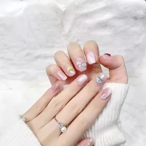 Pink cat eye press-on nails featuring 3D mushroom and heart charms for women