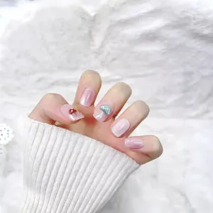 Short mushroom press-on nails with pink glitter base and 3D colorful fungi decor