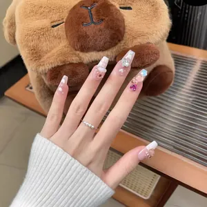 Handmade long ballerina press-on nails with cartoon bear, hearts and rhinestones