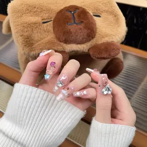 Handmade press-on nails with Capybara theme, long pink checkered design and 3D bear charms