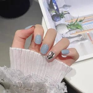 Elegant short grey-blue press-on nails with silver glitter accents and glossy finish