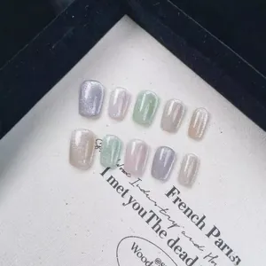 Rainbow cat eye short press-on nails with 10 pieces in macaron colors on display board