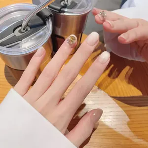 Handmade gradient gold cat eye press-on nails with champagne rhinestone accents