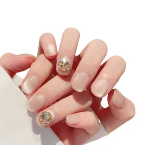 Handmade champagne gold cat eye press-on nails with luxury rhinestone accents