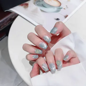 Silver grey cat eye press-on nails with 3D bows, pearls and glitter chains decoration