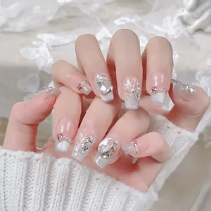 Handmade silver cat-eye press on nails with 3D butterfly and rhinestone accents