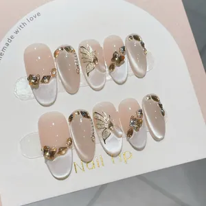 Handgefertigte Champagner Katzenauge Nägel Zum Aufdrücken Mit 3D Gold Schmetterling Strass Französisch Luxus Damen Künstliche Nägel