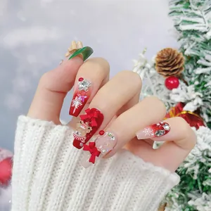 Handmade Christmas press-on nails with 3D bears, red bows and snowflakes on coffin shape
