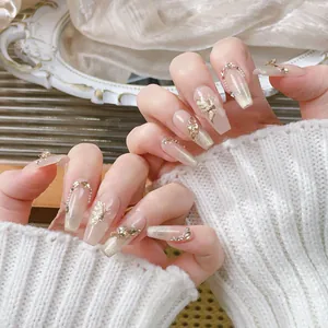 Luxurious handmade champagne cat eye press-on nails with 3D butterfly and crystal accents