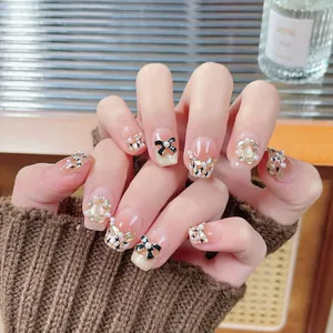 Handmade cat eye press-on nails with pearls, bowknot and French elegant blush design