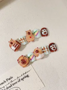 Detail of 3D handmade cartoon capybara press-on nails for kids with cute relief patterns