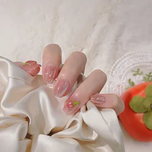 Handmade strawberry press-on nails with cat eye effect and cute floral 3D art design