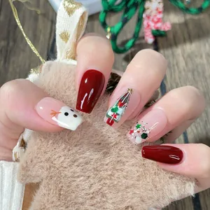 Uñas postizas de Navidad hechas a mano con purpurina roja, muñeco de nieve y árbol 3D