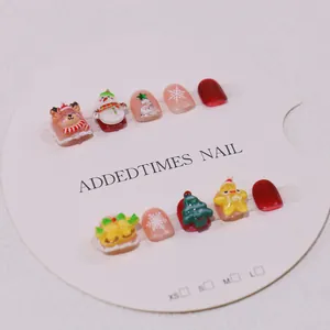 Handmade Christmas press-on nails for kids with 3D reindeer and snowman festive designs