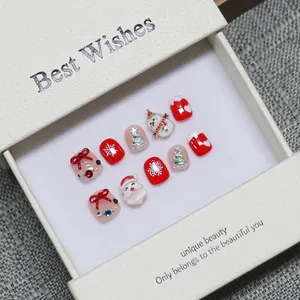 Handmade Christmas press-on nails set with 3D Santa and snowman in a white gift box