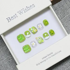 Handmade 3D green frog and floral press-on nails for kids in a premium white gift box
