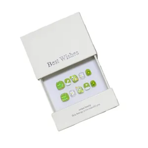 Handmade green cartoon frog press-on nails set with 3D flower charms in a gift box