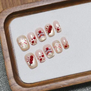 Handmade press-on nails with cat-eye glitter, 3D lion dance, and firework art for New Year