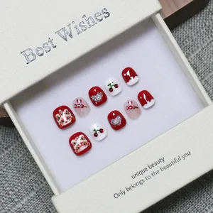 Handmade red lion dance press-on nails for girls in festive New Year style gift box