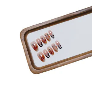 Handmade gradient cherry red press-on nails with 3D cherry accents and rhinestones