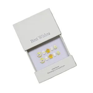 Cute yellow and white cartoon press-on nails set with 3D stars and flower charms