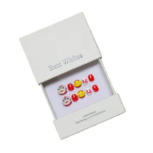 Faux ongles pour enfants avec lion chinois et lingots d'or en design rouge festif