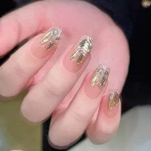 Champagne bunny press-on nails with 3D metallic charms and silver glitter decoration
