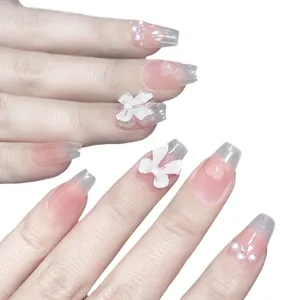 Pink and blue gradient press-on nails with 3D bows, pearls and embossed hearts