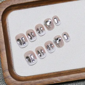 Handmade gradient French press-on nails with silver glitter and 3D heart diamond accents