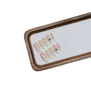 Handmade coffin press-on nails with 3D heart charms and pearls on nude french base