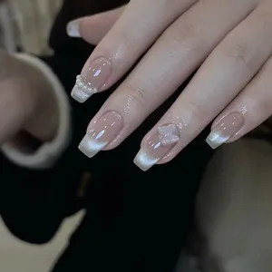 Handmade cat-eye press-on nails with 3D butterfly and pearl accents on square shape