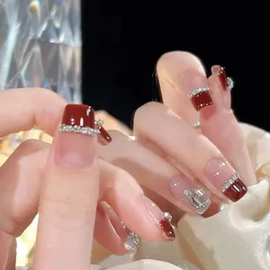 Handmade cherry red French press-on nails with silver glitter and wine red gradient