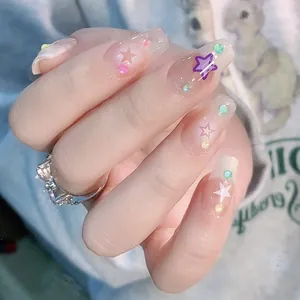 Handmade short coffin press-on nails with cute star patterns and colorful rhinestones