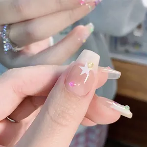 Handmade short square press-on nails with pink base, white stars, and colorful 3D beads