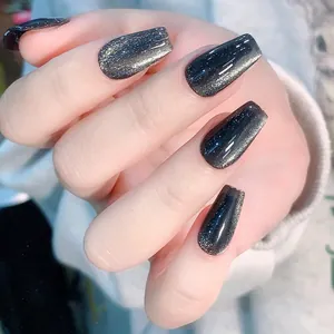 Deep grey cat eye magnetic false nails in long coffin shape with shimmering glitter
