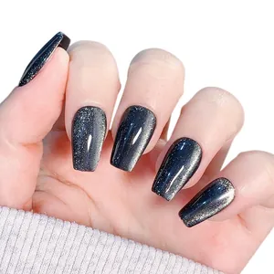 Handmade silver cat-eye press-on nails in medium ballerina shape with starry shimmer