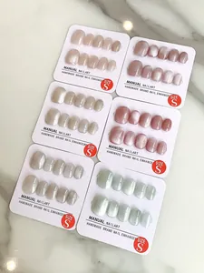 Detailed set of six handmade cat-eye press-on nails in various soft pastel colors