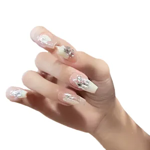 Handmade coffin press-on nails with white gradient, silver glitter, and rhinestone accents