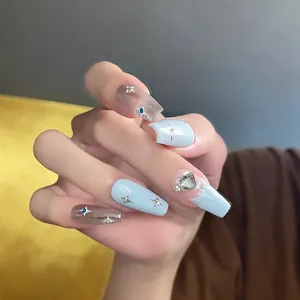 Blue and grey press-on nails with heart diamond and silver star glitter accents