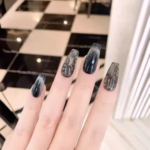 Long coffin black cat-eye press-on nails with 3D water droplet and pearl accents