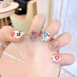 Handmade Y2K press-on nails with macaron colors, hand-painted hearts, and stars designs