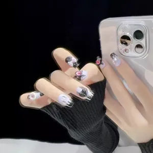 Faux ongles 3D faits main avec motif oeil de démon Y2K en noir, blanc et violet