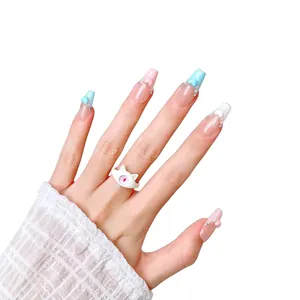 Handmade press-on nails with 3D hearts, rhinestones, and French tip style design