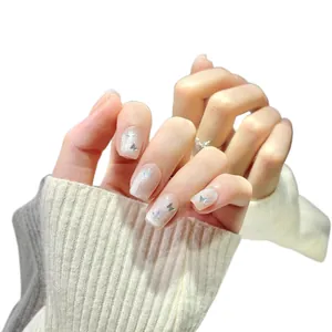 Short square cat eye press-on nails with silver glitter and laser butterfly accents