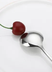 Macro view of mirror polished 304 stainless steel spoon with sleek reflective finish