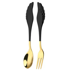 Elegant 304 stainless steel black wing handle spoon and fork set with gold mirror finish