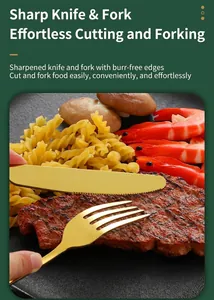 Detail of gold stainless steel knife and fork cutting steak and seafood dish
