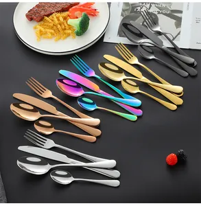 Polished stainless steel cutlery set detail in silver, gold, rose gold and black finishes