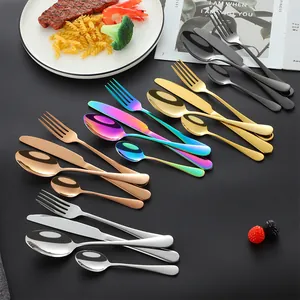48-piece mirror polished stainless steel cutlery set in multiple colors on a dark table