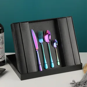 24-piece iridescent stainless steel cutlery set with rainbow finish in a black gift box